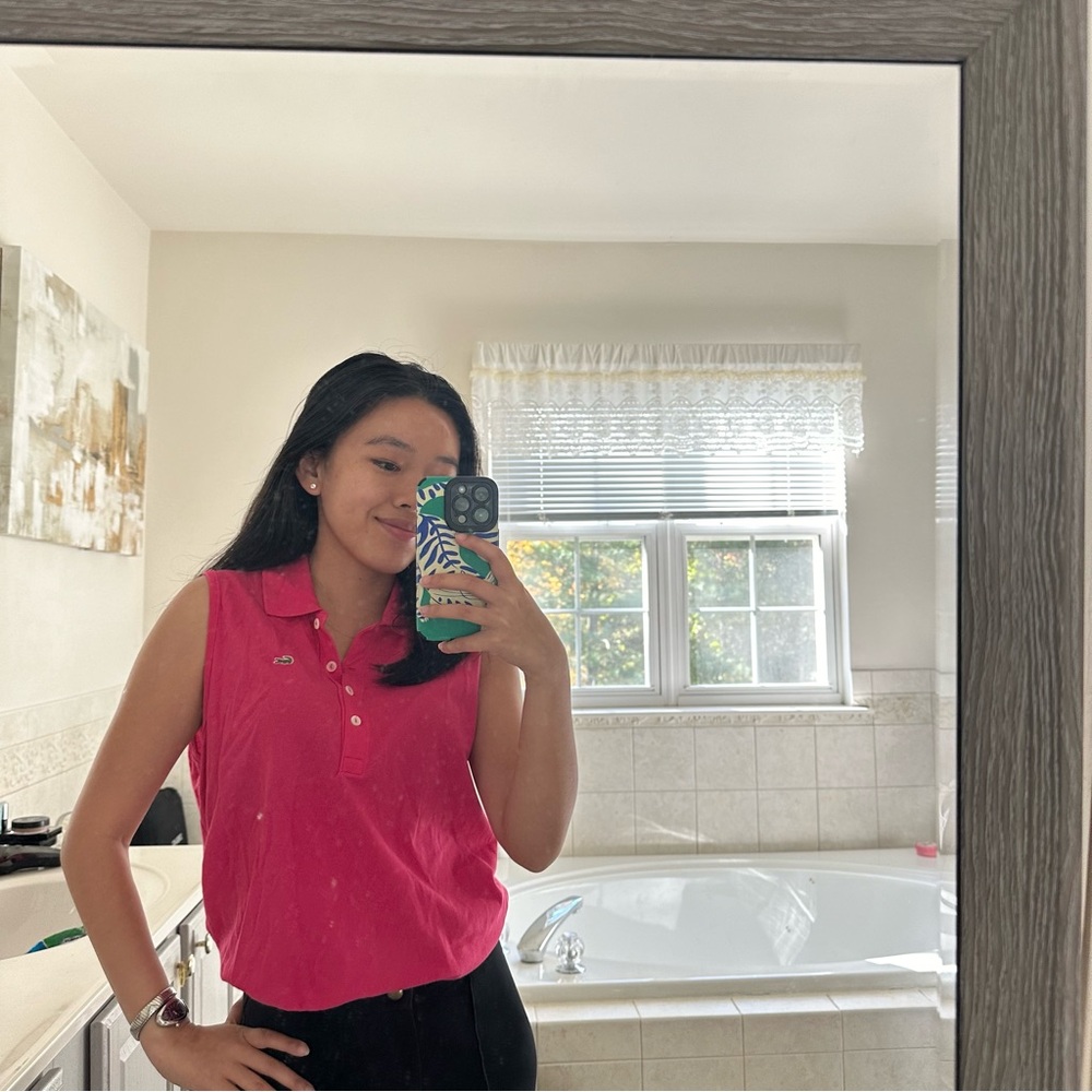 Pink Lacoste sleeveless polo shirt size 46 (~Large)
Orig $125